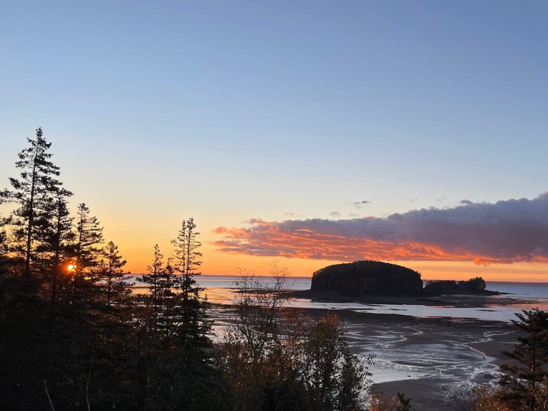 Sunrise over the Two Islands and the Bay of Fundy mudflats at low tide