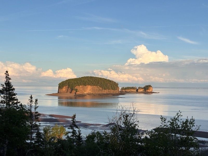 The Two Islands glowing at golden hour on the Bay of Fundy